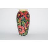 Modern Moorcroft vase with a floral design, the base marked "Trial" dated 28/11/02, 26cm high