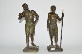 Pair of Victorian spelter African figures, one a water carrier, the other carrying a staff (2),