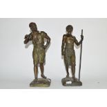 Pair of Victorian spelter African figures, one a water carrier, the other carrying a staff (2),