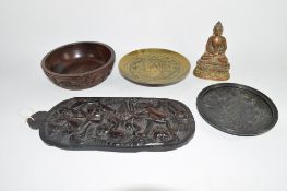 Gilt brass model of a Buddha, further brass dishes and wooden plaque