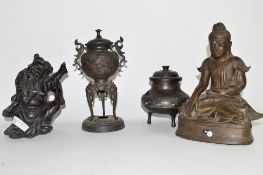 Two Oriental bronze censers and a carved hardwood Chinese figure (3)
