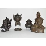 Two Oriental bronze censers and a carved hardwood Chinese figure (3)