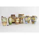 Group of seven Noritake vases, all decorated in typical fashion with landscape scenes and some