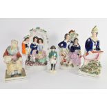Group of five Staffordshire figures, mid-19th century, including one of Napoleon (5)