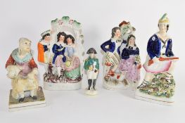 Group of five Staffordshire figures, mid-19th century, including one of Napoleon (5)