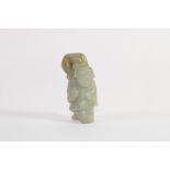 Chinese green jade carving of an Oriental with cat on his shoulder, 8cm high