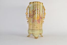 Vase with lobed shape with floral design on four feet, the base marked "Old Hall", 30cm high