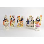 Group of five Staffordshire spill holder figures mainly in Highland dress (5)