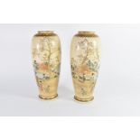 Pair of cylindrical Satsuma ware vases decorated with Japanese figures in landscapes (2)