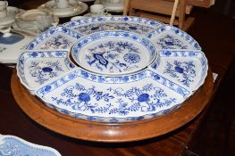 Lazy Susan with dishes produced by Villeroy & Boch all decorated in blue in Meissen style comprising