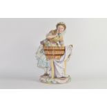 Late 19th century Continental porcelain model of a washer girl on a circular base with tub of