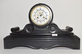 Victorian large black marble mantel clock, circular Roman chapter ring and exposed escapement, 55.