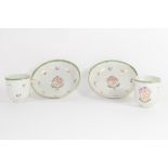 Pair of 18th century Chinese export porcelain armorial tea cups and saucers (one cup a/f) (4)