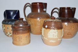 Group of Royal Doulton Harvest ware jugs together with a Royal Doulton tobacco jar, (5)