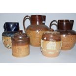 Group of Royal Doulton Harvest ware jugs together with a Royal Doulton tobacco jar, (5)