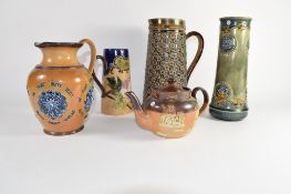 Group of Lambeth Doulton wares including a large jug with silver metal rim, further jug with various