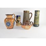 Group of Lambeth Doulton wares including a large jug with silver metal rim, further jug with various