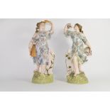 Pair of Continental porcelain figures, probably Sitzendorf, decorated in Meissen style, both figures