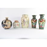 Group of Oriental pottery wares including a large vase with figures, further pair of vases with