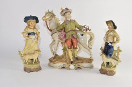 Continental pottery equestrian group, together with two Continental pottery figures of a shepherd