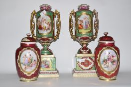 Group of Continental porcelain wares including a pair of vases with covers and decorated with