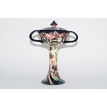 Modern Moorcroft vase and cover in Art Nouveau shape, decorated with tube lined flowers, the base