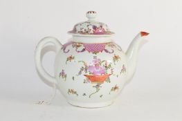 Lowestoft porcelain tea pot and cover with a polychrome design in famille rose, 16cm high