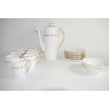 Spode coffee set in the Delphi pattern comprising coffee pot, sugar bowl and 9 cups and saucers
