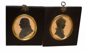 Pair of 19th century black and white silhouettes, male and female profiles, 9 x 7cm (2)