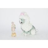 POTTERY MODEL OF A POODLE BY DORIS DAWSON