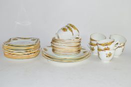 MID-20TH CENTURY TEA SET WITH EIGHT CUPS, SAUCERS, SIDE PLATES AND SERVING DISHES