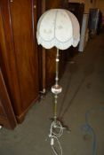 MID-20TH CENTURY BRASS LAMP STANDARD WITH PORCELAIN DECORATIVE MOUNT, HEIGHT APPROX 155CM