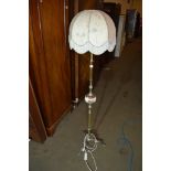 MID-20TH CENTURY BRASS LAMP STANDARD WITH PORCELAIN DECORATIVE MOUNT, HEIGHT APPROX 155CM