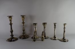 SILVER COLOURED METAL ITEMS INCLUDING THREE PAIRS OF CANDLESTICKS AND A SALT AND PEPPER