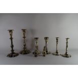 SILVER COLOURED METAL ITEMS INCLUDING THREE PAIRS OF CANDLESTICKS AND A SALT AND PEPPER