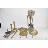 QUANTITY OF BRASS WARES INCLUDING FIRESIDE IMPLEMENTS AND TRIVETS