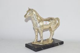 MODEL OF A HORSE ON ONYX BASE, SILVER COLOURED METAL