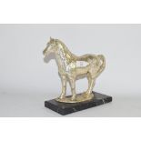 MODEL OF A HORSE ON ONYX BASE, SILVER COLOURED METAL