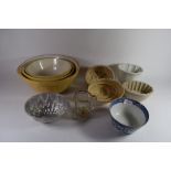 BOX CONTAINING JELLY MOULDS AND POTTERY DISHES