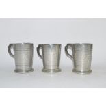 GROUP OF HAMMERED PEWTER TANKARDS