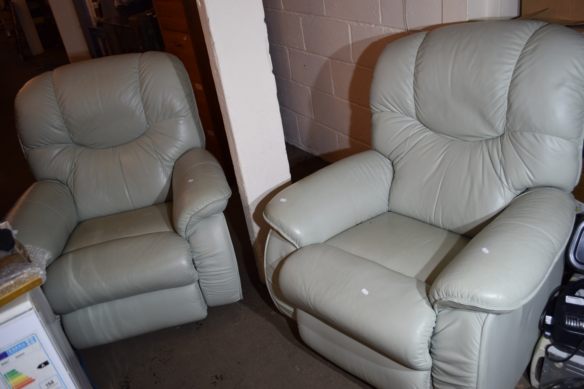PAIR OF LEATHER FACED RECLINING ARMCHAIRS