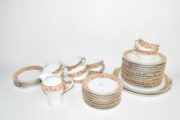 PART POTTERY TEA SET WITH FLORAL DESIGN