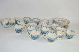 MASONS IRONSTONE CUPS AND SAUCERS WITH A PRINTED FLORAL AND FRUIT DESIGN, TOGETHER WITH A QUANTITY