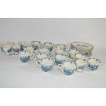 MASONS IRONSTONE CUPS AND SAUCERS WITH A PRINTED FLORAL AND FRUIT DESIGN, TOGETHER WITH A QUANTITY