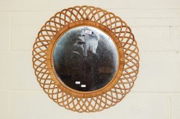 CIRCULAR MIRROR WITH CANE SURROUND, TOTAL DIAM APPROX 60CM