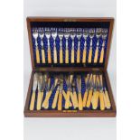BOXED SET OF FISH KNIVES AND FORKS WITH BONE HANDLES