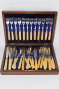 BOXED SET OF FISH KNIVES AND FORKS WITH BONE HANDLES