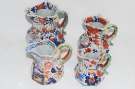 FOUR MASONS IRONSTONE TYPE JUGS WITH IMARI DESIGNS