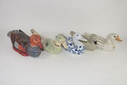 FIVE POTTERY DUCKS, SOME WITH PAINTED DESIGNS