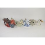 FIVE POTTERY DUCKS, SOME WITH PAINTED DESIGNS